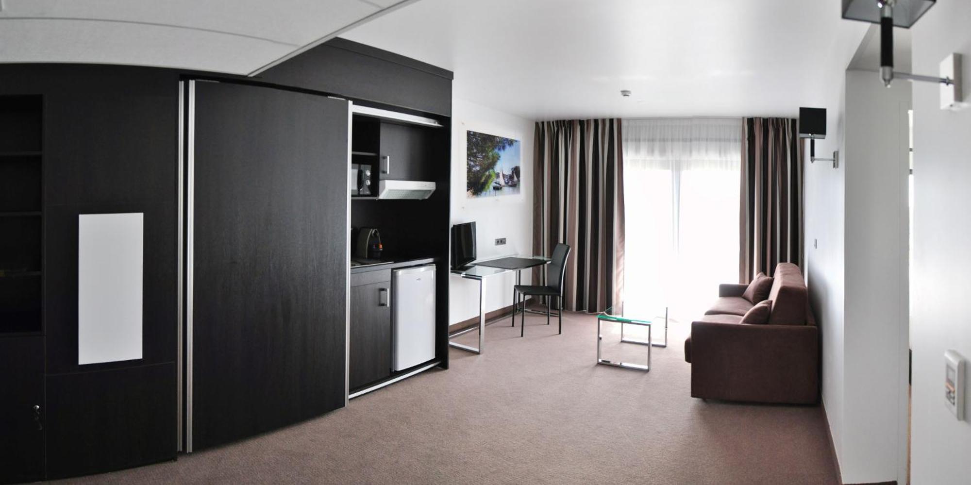 Golden Tulip Pornic Suites Kamer foto