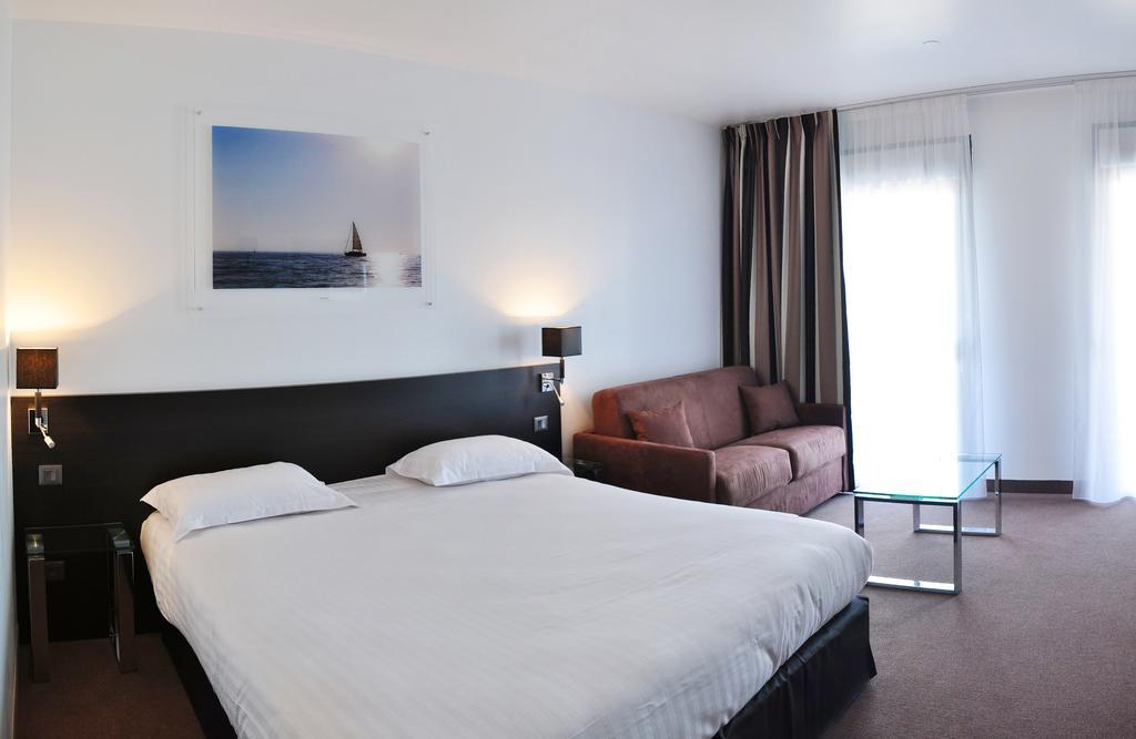 Golden Tulip Pornic Suites Buitenkant foto